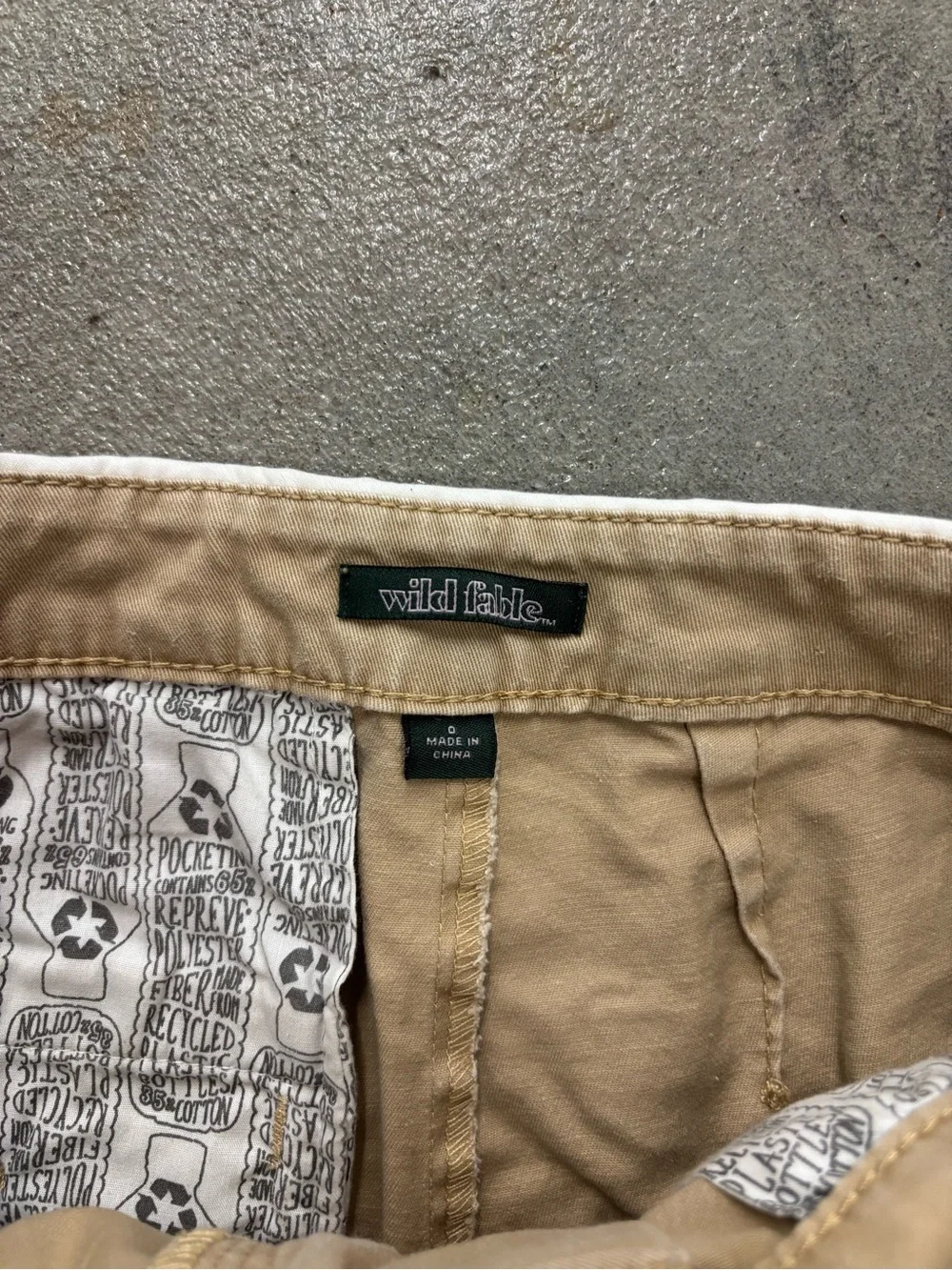 khaki skort with white trim